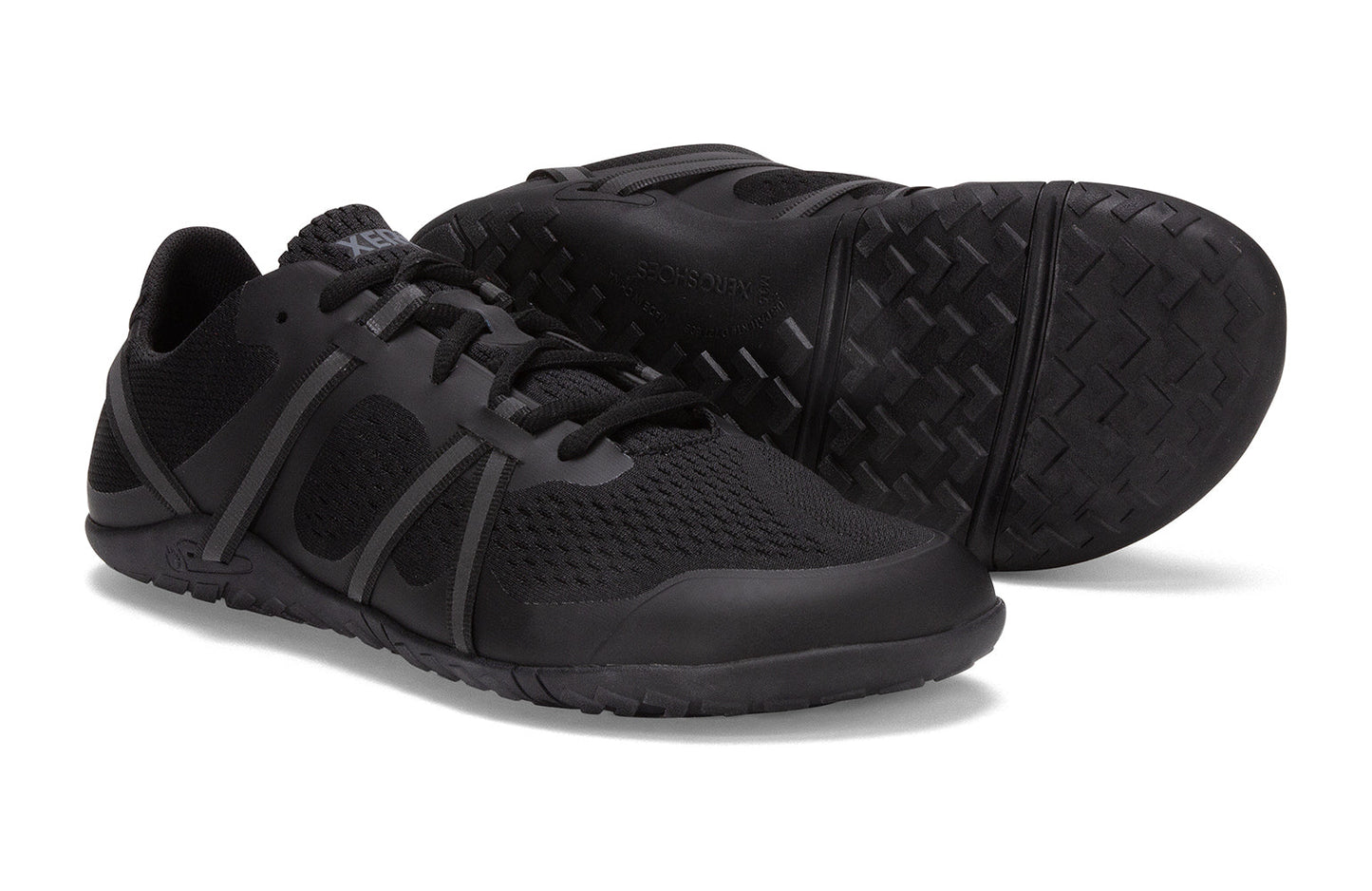 Xero Barefoot Shoes sold in Ontario, Canada. These minimalist shoes have flexible soles, wide toe boxes, and zero drop. Side and sole pair view of Xero Women's Speed Force II in Black. Running and speed training shoe.