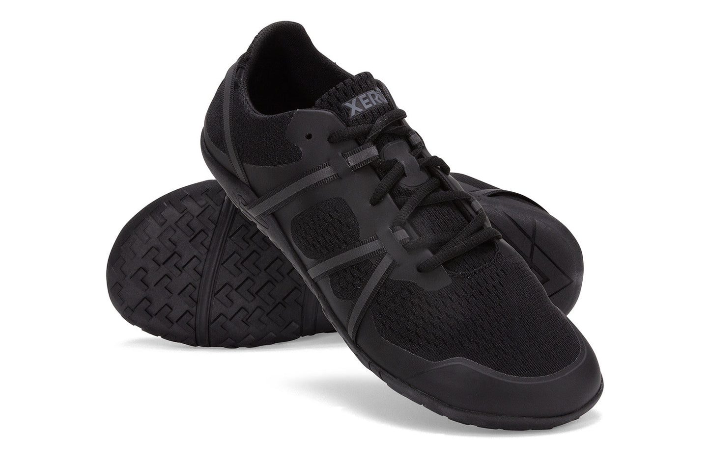 Xero Barefoot Shoes sold in Ontario, Canada. These minimalist shoes have flexible soles, wide toe boxes, and zero drop. Angled pair view of Xero Women's Speed Force II in Black. Running and speed training shoe.