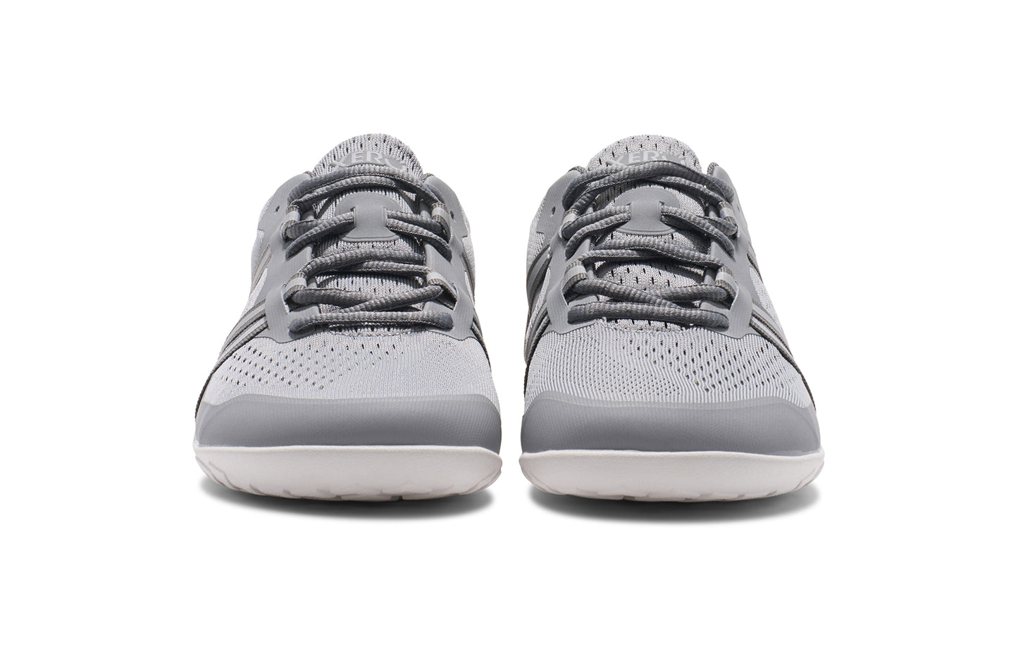 Xero Barefoot Shoes sold in Ontario, Canada. These minimalist shoes have flexible soles, wide toe boxes, and zero drop. Front view of Xero Women's Speed Force II in Alloy Silver. Running and speed training shoe.