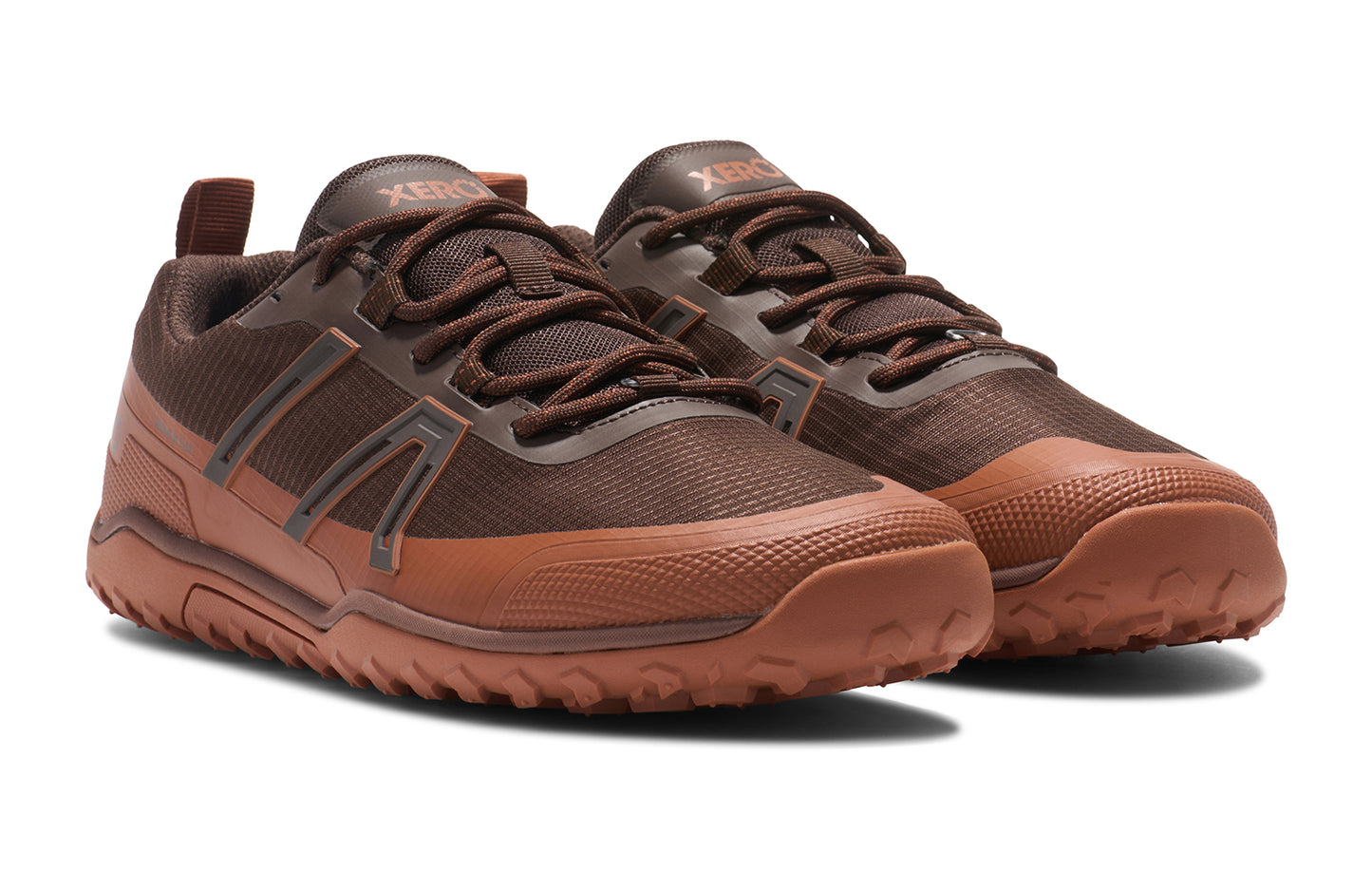 Xero Barefoot Shoes sold in Ontario, Canada. These minimalist shoes have flexible soles, wide toe boxes, and zero drop. Angled view of Xero Men's Scrambler Trail Low WP in Java Brown/Mocha Bisque, a sturdy hiking shoe