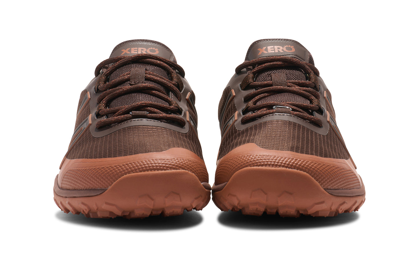 Xero Barefoot Shoes sold in Ontario, Canada. These minimalist shoes have flexible soles, wide toe boxes, and zero drop. Angled view of Xero Men's Scrambler Trail Low WP in Java Brown/Mocha Bisque, a sturdy hiking shoe