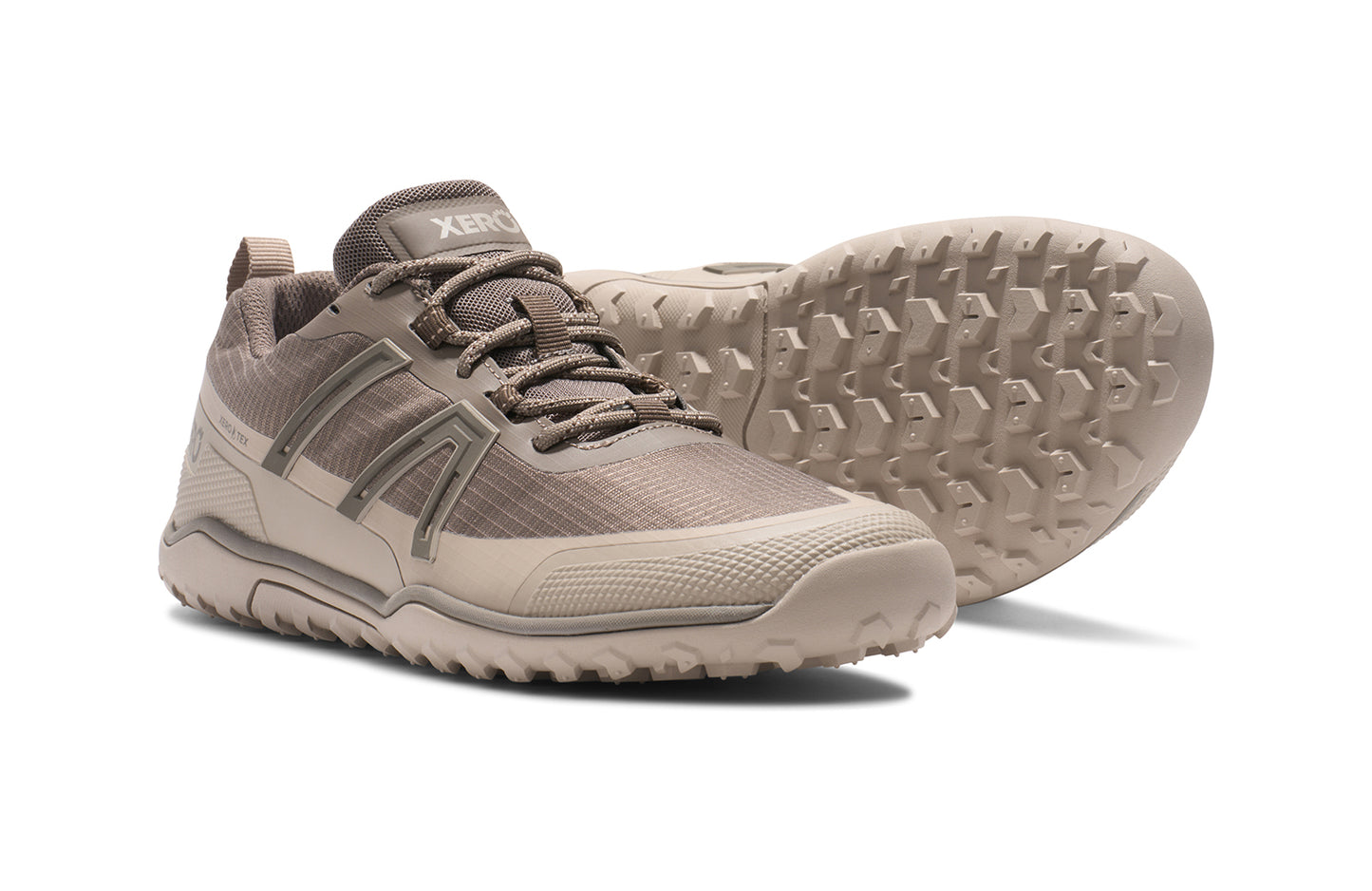 Xero Barefoot Shoes sold in Ontario, Canada. These minimalist shoes have flexible soles, wide toe boxes, and zero drop. Side and sole view of Xero Women's Scrambler Trail Low WP in Morel/Pure Cashmere- a sturdy hiking shoe
