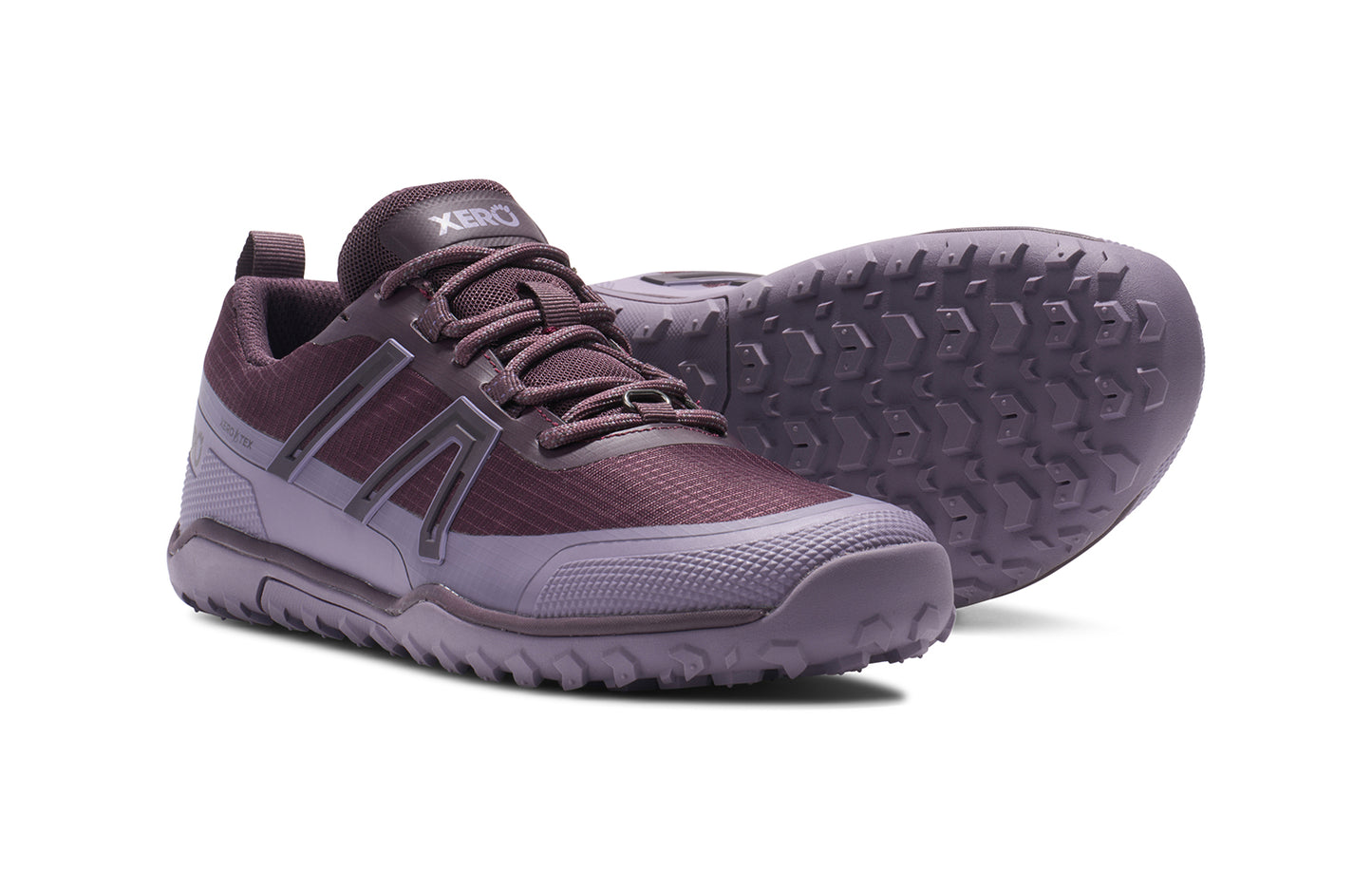 Xero Barefoot Shoes sold in Ontario, Canada. These minimalist shoes have flexible soles, wide toe boxes, and zero drop. Side and sole view of Xero Women's Scrambler Trail Low WP in Plum Perfect/Sage Purple- a sturdy hiking shoe
