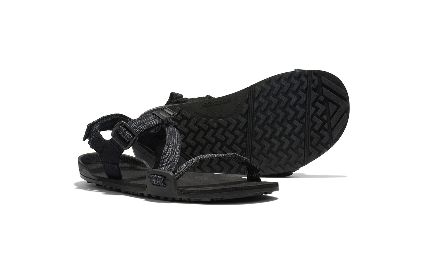 Xero Kid's Barefoot Shoes sold in Ontario, Canada. These minimalist shoes have flexible soles, wide toe boxes, and zero drop. Pair view of Xero Kid's Z-Trail in Blue, a lightweight packable sport sandal.