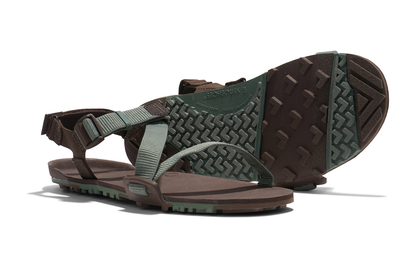Xero Barefoot Shoes sold in Ontario, Canada. These minimalist shoes have flexible soles, wide toe boxes, and zero drop. Pair view of Xero Men's Z-Trail EV in Dark Forest/Java Brown. Trail hiking, running, and recovery sandal.