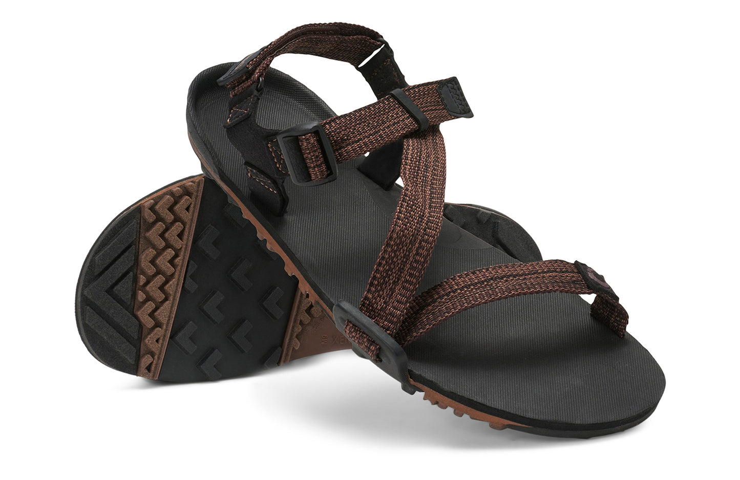 Xero Barefoot Shoes sold in Ontario, Canada. These minimalist shoes have flexible soles, wide toe boxes, and zero drop. Angled pair view of Xero Men's Z-Trail EV in Multi-Brown. Trail hiking, running, and recovery sandal.