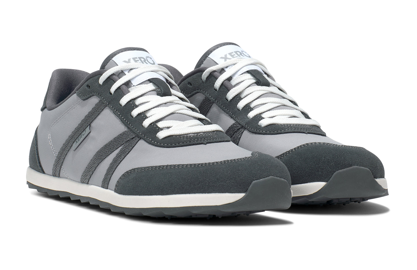 Xero Barefoot Shoes sold in Ontario, Canada. These minimalist shoes have flexible soles, wide toe boxes, and zero drop. Angle view of Xero Men's Wynn in Alloy/Steel Gray, a casual sneaker