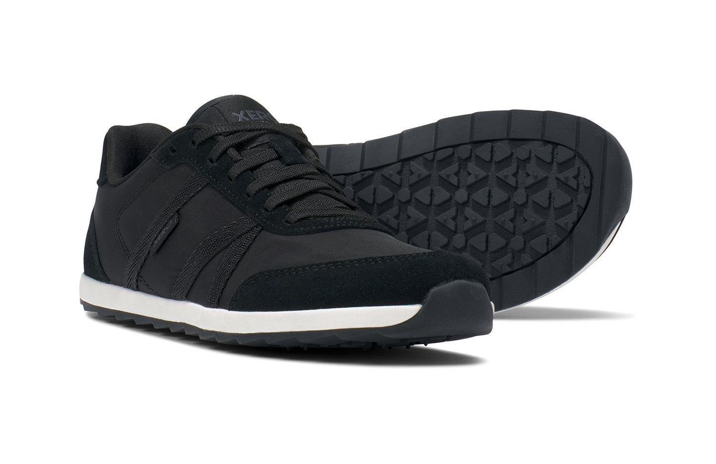 Xero Barefoot Shoes sold in Ontario, Canada. These minimalist shoes have flexible soles, wide toe boxes, and zero drop. Pair view of Xero's Wynn in Black/White, a casual sneaker