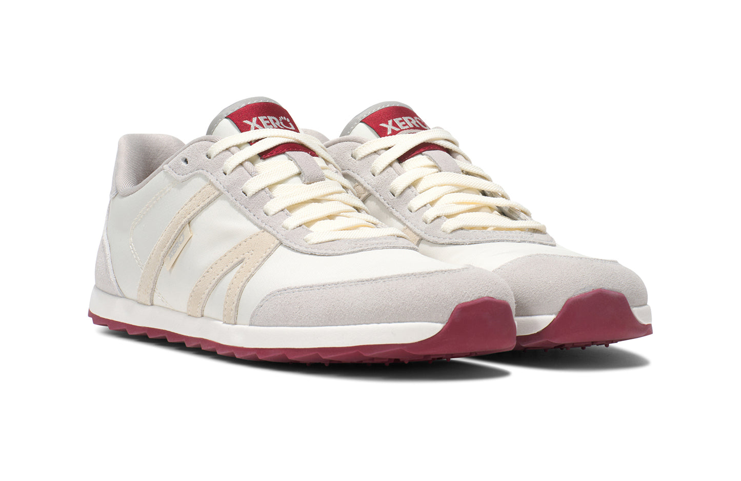 Xero Barefoot Shoes sold in Ontario, Canada. These minimalist shoes have flexible soles, wide toe boxes, and zero drop. Pair side view of Xero's Wynn in Tan/Pink/Sand/Red, a casual sneaker