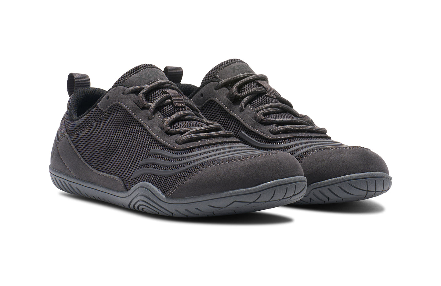 Xero Shoes Canada, specifically barefoot running shoes Canada. These minimalist shoes have flexible soles, wide toe boxes, and zero drop. Angled view of Xero Women's 360s in Asphalt/Gray. A cross-training shoe.