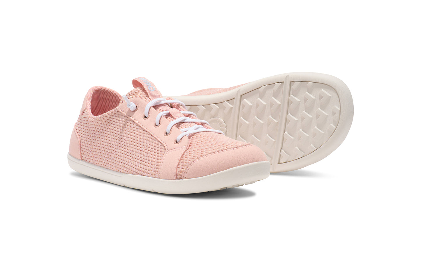 Xero Shoes Canada, barefoot shoes for kids. These minimalist shoes have flexible soles, wide toe boxes, and zero drop. Pair view of Xero Big Kid's Dillon in Pink Sand, a classic sneaker.