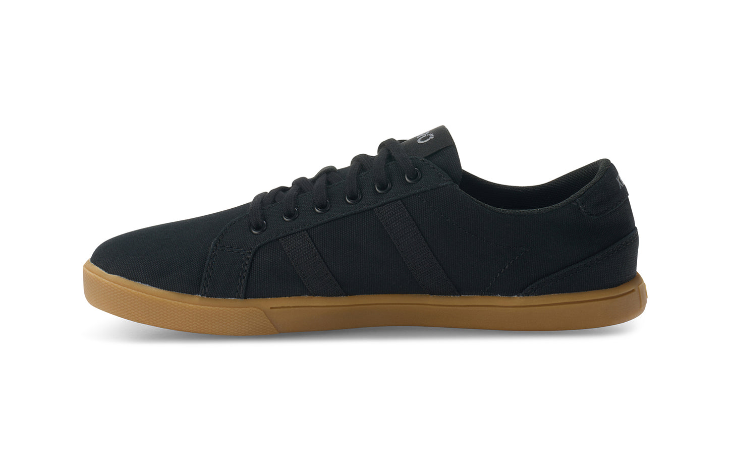 Xero Shoes Canada, specifically men’s barefoot shoes Canada. These minimalist shoes have flexible soles, wide toe boxes, and zero drop. Pair view of Xero Men's Dillon Canvas in Black Gum, a classic sneaker.