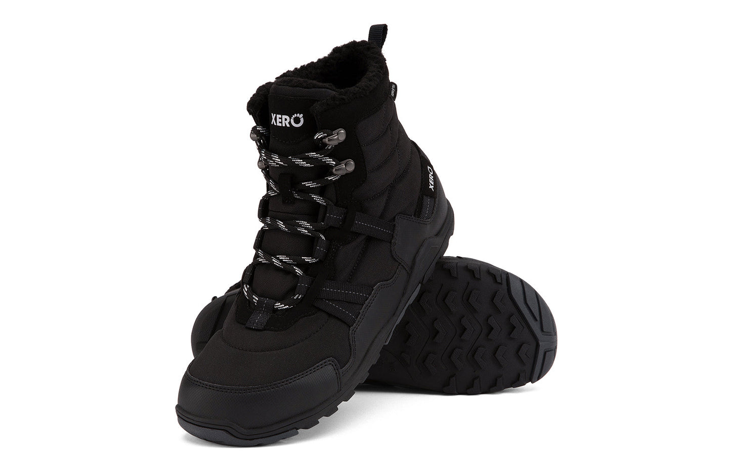 Xero Shoes Canada, specifically men’s barefoot shoes Canada. These minimalist shoes have flexible soles, wide toe boxes, and zero drop. Angled pair view of Xero Men's Alpine in Black. Waterproof, lightweight snow boot.