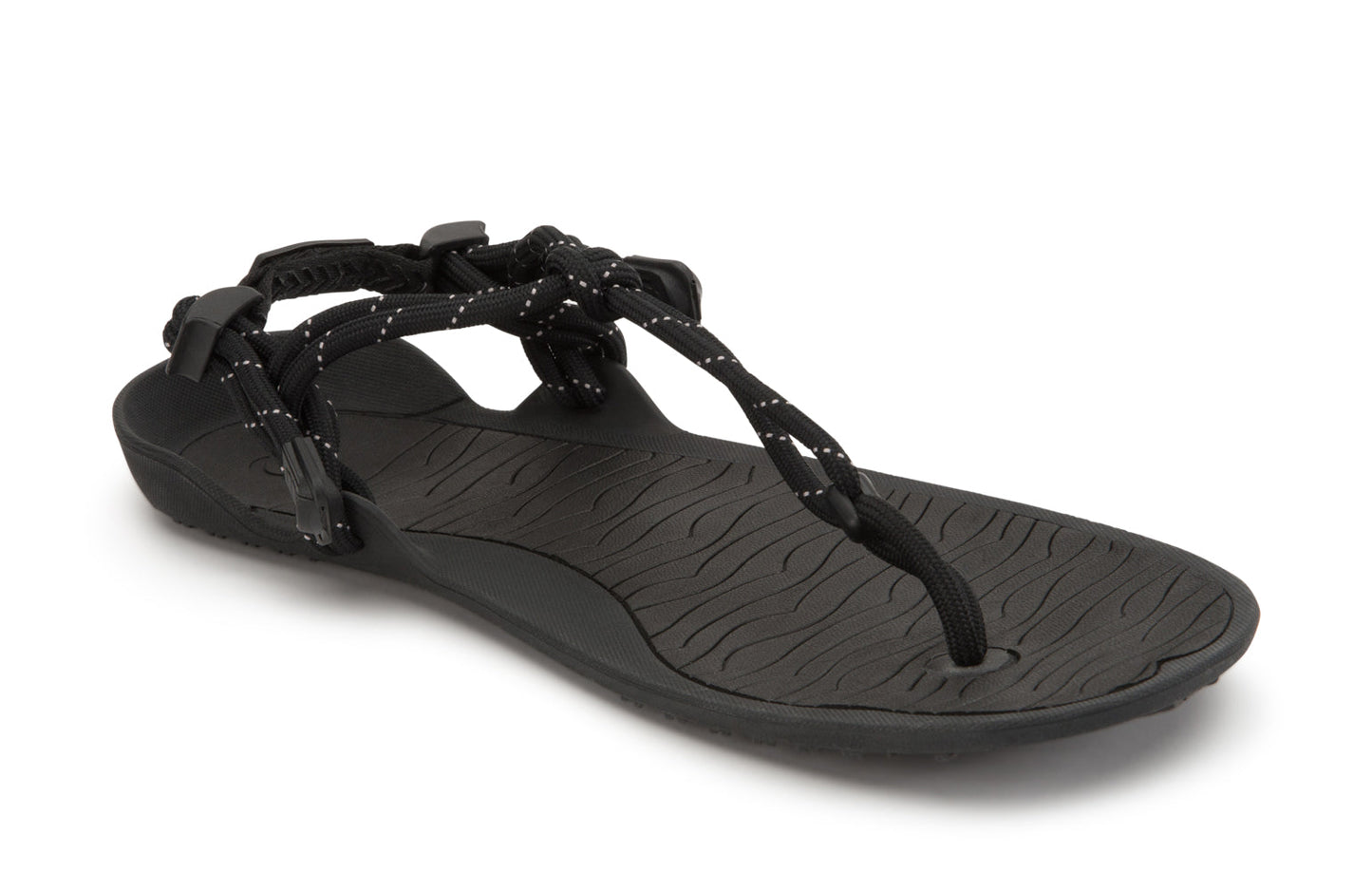 Xero Shoes Canada, specifically men’s barefoot shoes Canada. These minimalist shoes have flexible soles, wide toe boxes, and zero drop. Angled view of Xero Men's Aqua Cloud in Black. Versatile water sport and hiking sandal.