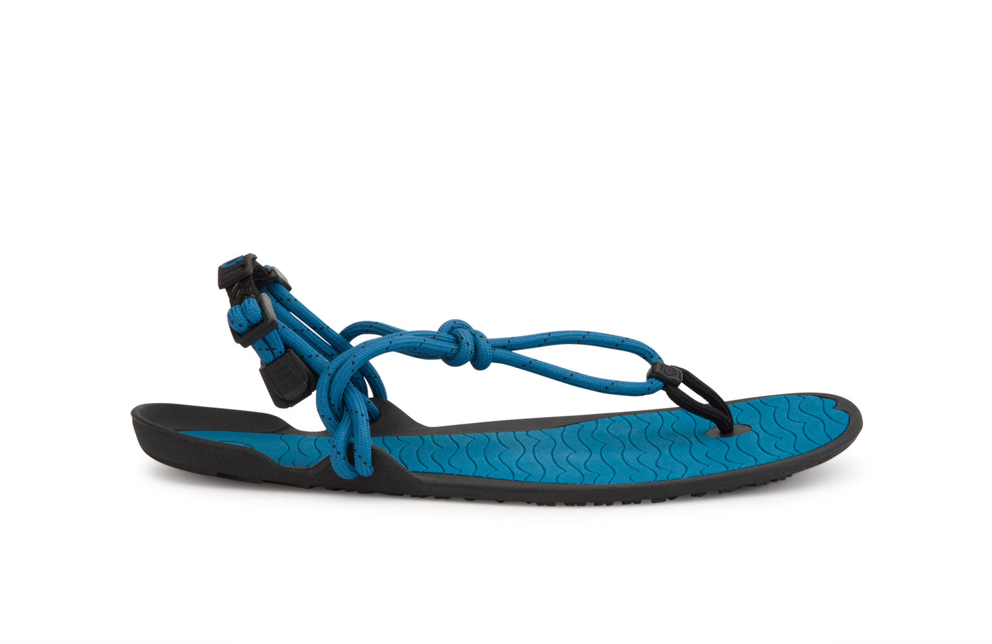 Xero Shoes Canada, specifically men’s barefoot shoes Canada. These minimalist shoes have flexible soles, wide toe boxes, and zero drop. Lateral side view of Xero Men's Aqua Cloud in Blue Sapphire. Versatile water sport and hiking sandal.