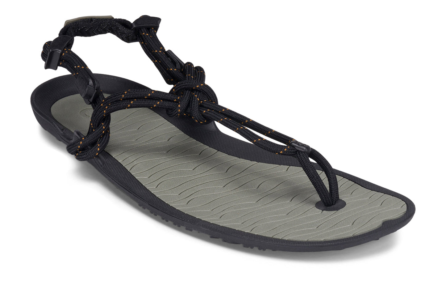 Xero Shoes Canada, specifically men’s barefoot shoes Canada. These minimalist shoes have flexible soles, wide toe boxes, and zero drop. Angled view of Xero Men's Aqua Cloud in Vetiver Green. Versatile water sport and hiking sandal.