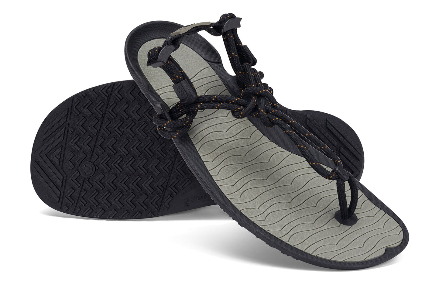 Xero Shoes Canada, specifically men’s barefoot shoes Canada. These minimalist shoes have flexible soles, wide toe boxes, and zero drop. Angled pair view of Xero Men's Aqua Cloud in Vetiver Green. Versatile water sport and hiking sandal.