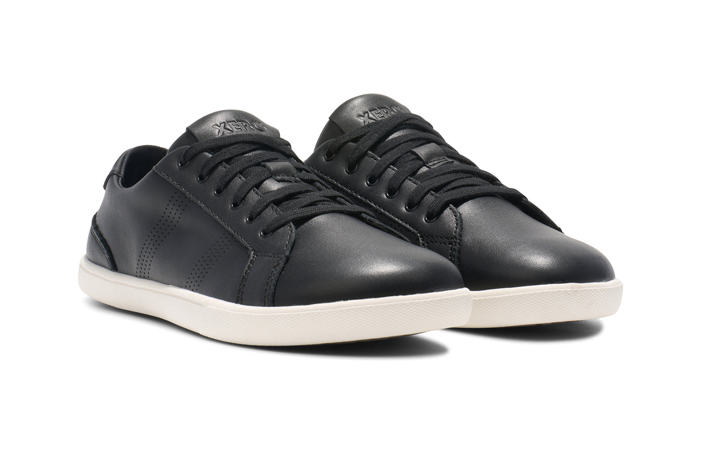 Xero Shoes Canada, specifically men’s barefoot shoes Canada. These minimalist shoes have flexible soles, wide toe boxes, and zero drop. Angled view of Dillon Leather in Black. A classic leather sneaker.