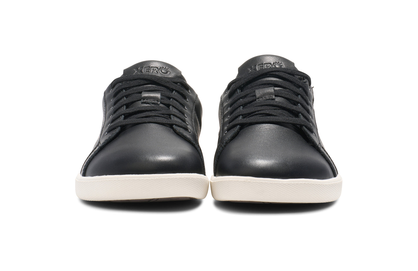 Xero Shoes Canada, specifically men’s barefoot shoes Canada. These minimalist shoes have flexible soles, wide toe boxes, and zero drop. Front view of Dillon Leather in Black. A classic leather sneaker.