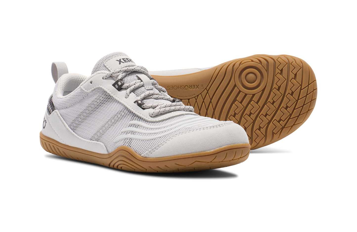Xero Shoes Canada, specifically barefoot running shoes Canada. These minimalist shoes have flexible soles, wide toe boxes, and zero drop. Pair view of Xero Women's 360s in Sunset Lunar Rock/Gum. A cross-training shoe.