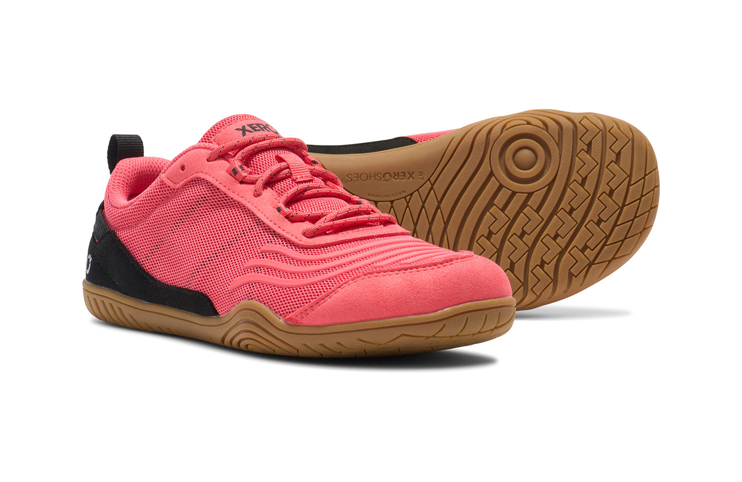 Xero Shoes Canada, specifically barefoot running shoes Canada. These minimalist shoes have flexible soles, wide toe boxes, and zero drop. Pair view of Xero Women's 360s in Sunset Coral/Black Gum. A cross-training shoe.