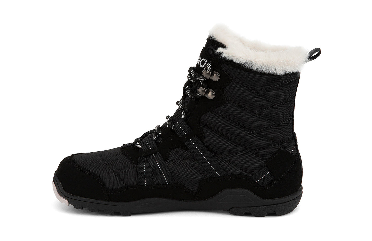 Xero Shoes Canada, specifically women’s barefoot shoes Canada. These minimalist shoes have flexible soles, wide toe boxes, and zero drop. Medial side view of Xero Women's Alpine in Black. Waterproof, lightweight snow boot.