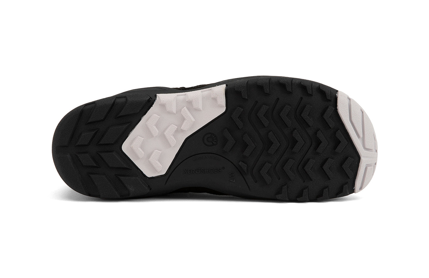 Xero Shoes Canada, specifically women’s barefoot shoes Canada. These minimalist shoes have flexible soles, wide toe boxes, and zero drop. Sole view of Xero Women's Alpine in Black. Waterproof, lightweight snow boot.