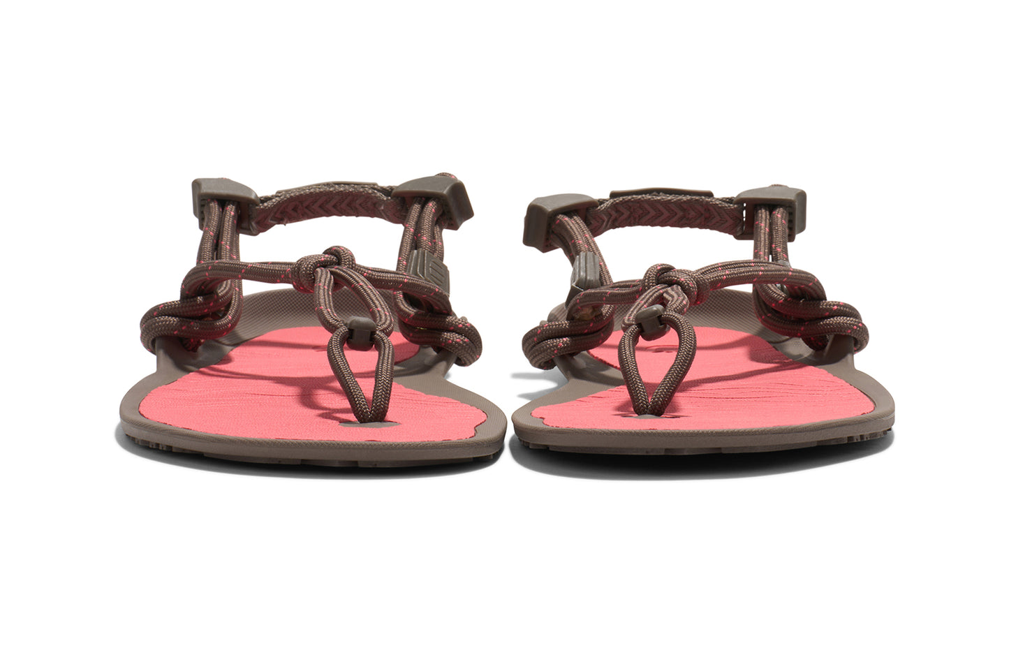 Xero Shoes Canada, specifically women’s barefoot shoes Canada. These minimalist shoes have flexible soles, wide toe boxes, and zero drop. Front view of Xero Women's Aqua Cloud in Morel/Sunset Coral. Versatile water sport and hiking sandal.