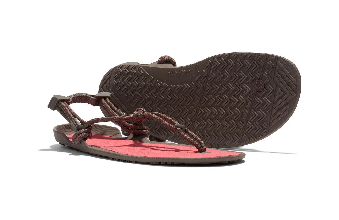 Xero Shoes Canada, specifically women’s barefoot shoes Canada. These minimalist shoes have flexible soles, wide toe boxes, and zero drop. Pair view of Xero Women's Aqua Cloud in Morel/Sunset Coral. Versatile water sport and hiking sandal.
