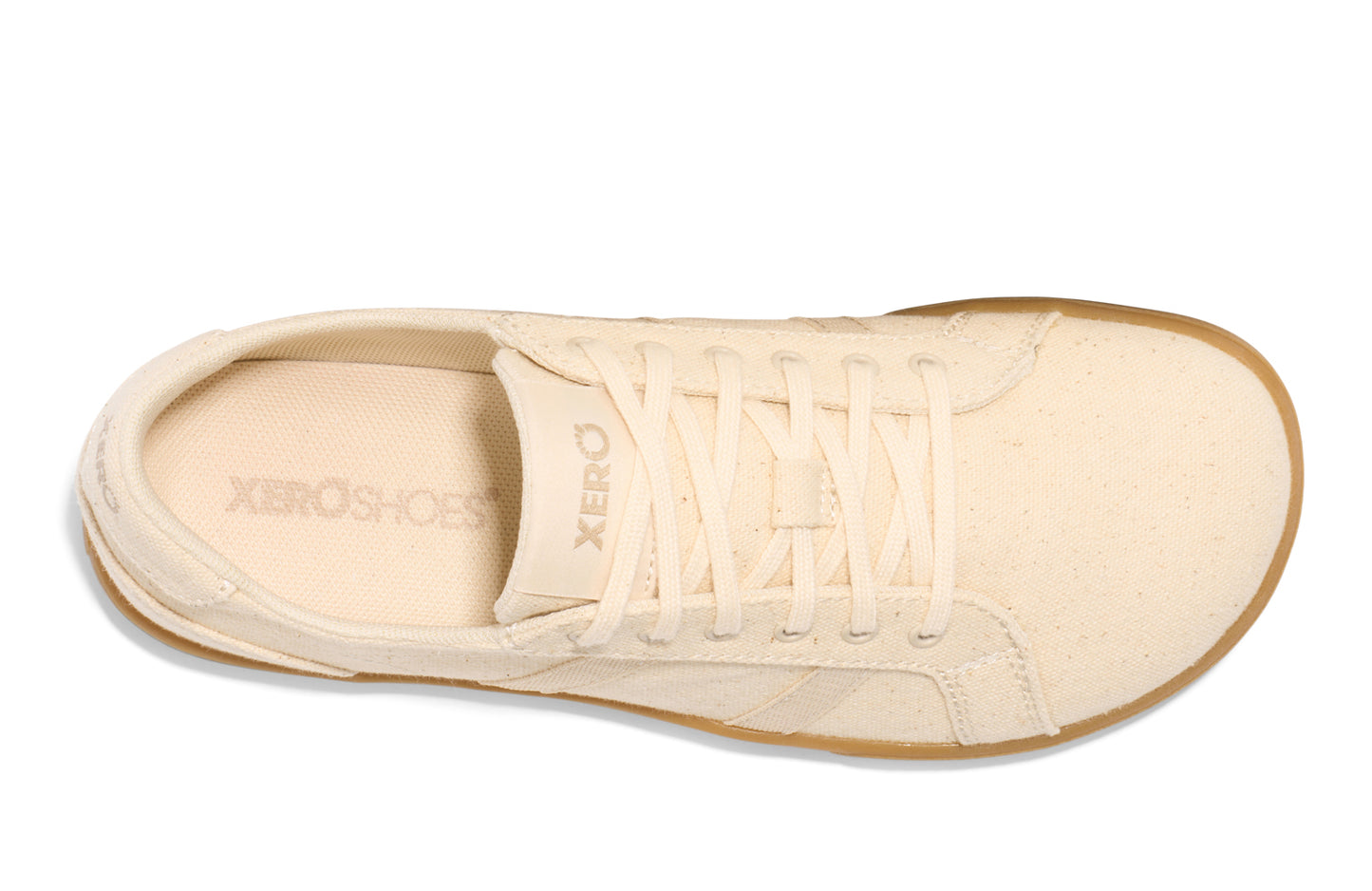 Xero Shoes Canada, specifically women’s barefoot shoes Canada. These minimalist shoes have flexible soles, wide toe boxes, and zero drop. Top view of Xero Women's Dillon Canvas in Natural Gum, a classic sneaker.