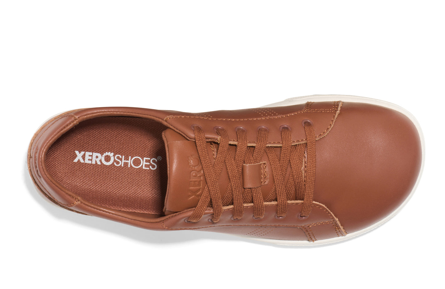 Xero Shoes Canada, specifically women’s barefoot shoes Canada. These minimalist shoes have flexible soles, wide toe boxes, and zero drop. Top view of Women's Dillon Leather in Mocha Bisque. A classic leather sneaker.