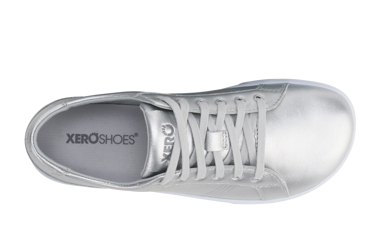Xero Barefoot Shoes sold in Ontario, Canada. These minimalist shoes have flexible soles, wide toe boxes, and zero drop. Top view of Dillon Leather in Silver Metallic. A classic leather sneaker.