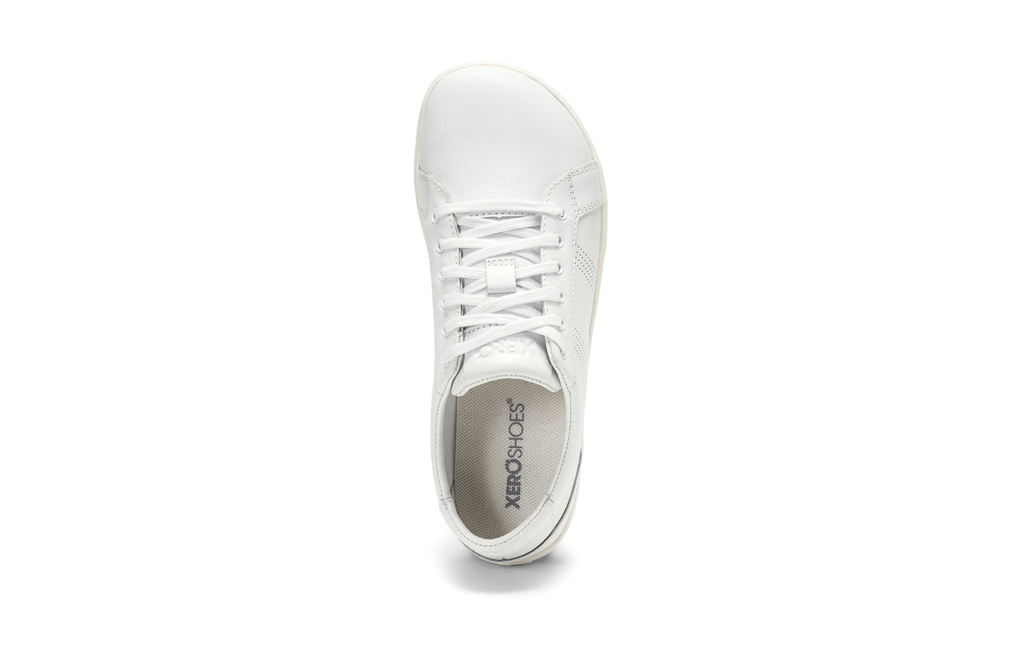 Xero Shoes Canada, specifically women’s barefoot shoes Canada. These minimalist shoes have flexible soles, wide toe boxes, and zero drop. Top view of Women's Dillon Leather in White. A classic leather sneaker.