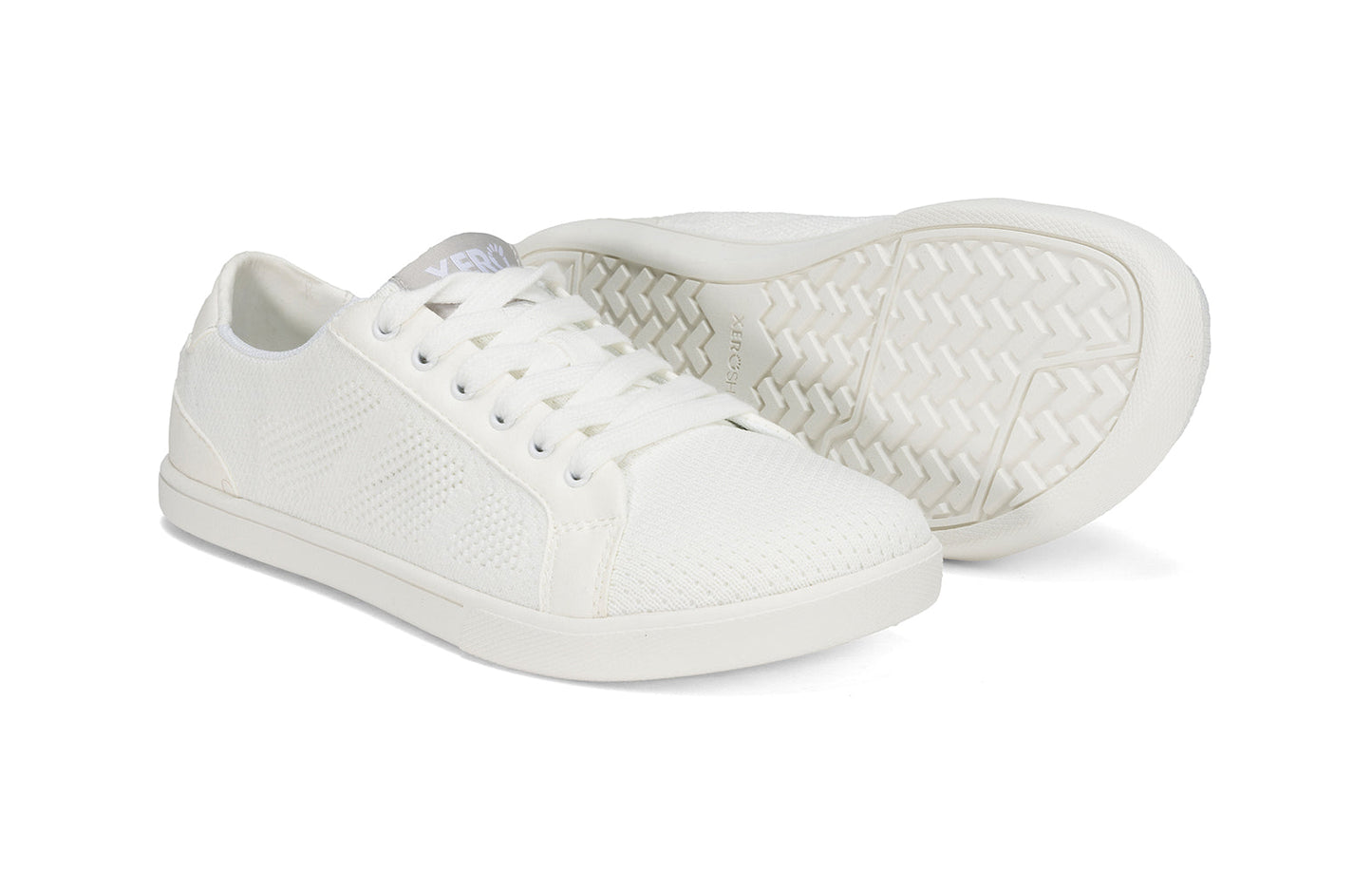 Xero Shoes Canada, specifically women’s barefoot shoes Canada. These minimalist shoes have flexible soles, wide toe boxes, and zero drop. Pair view of Xero Women's Dillon in White. Classic, casual sneaker