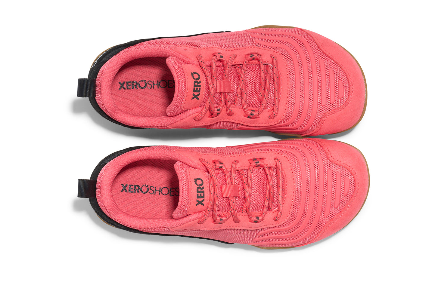 Xero Shoes Canada, specifically barefoot running shoes Canada. These minimalist shoes have flexible soles, wide toe boxes, and zero drop. Top view of Xero Women's 360s in Sunset Coral/Black Gum. A cross-training shoe.