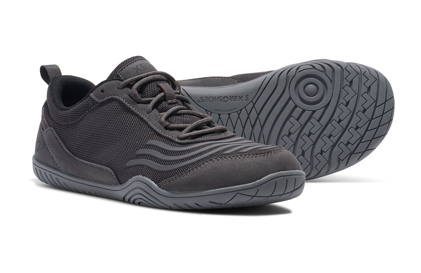 Xero shoes Canada, specifically barefoot running shoes Canada. These minimalist shoes have flexible soles, wide toe boxes, and zero drop. Pair view of Xero Men's 360s in Asphalt/Gray. A cross-training shoe.