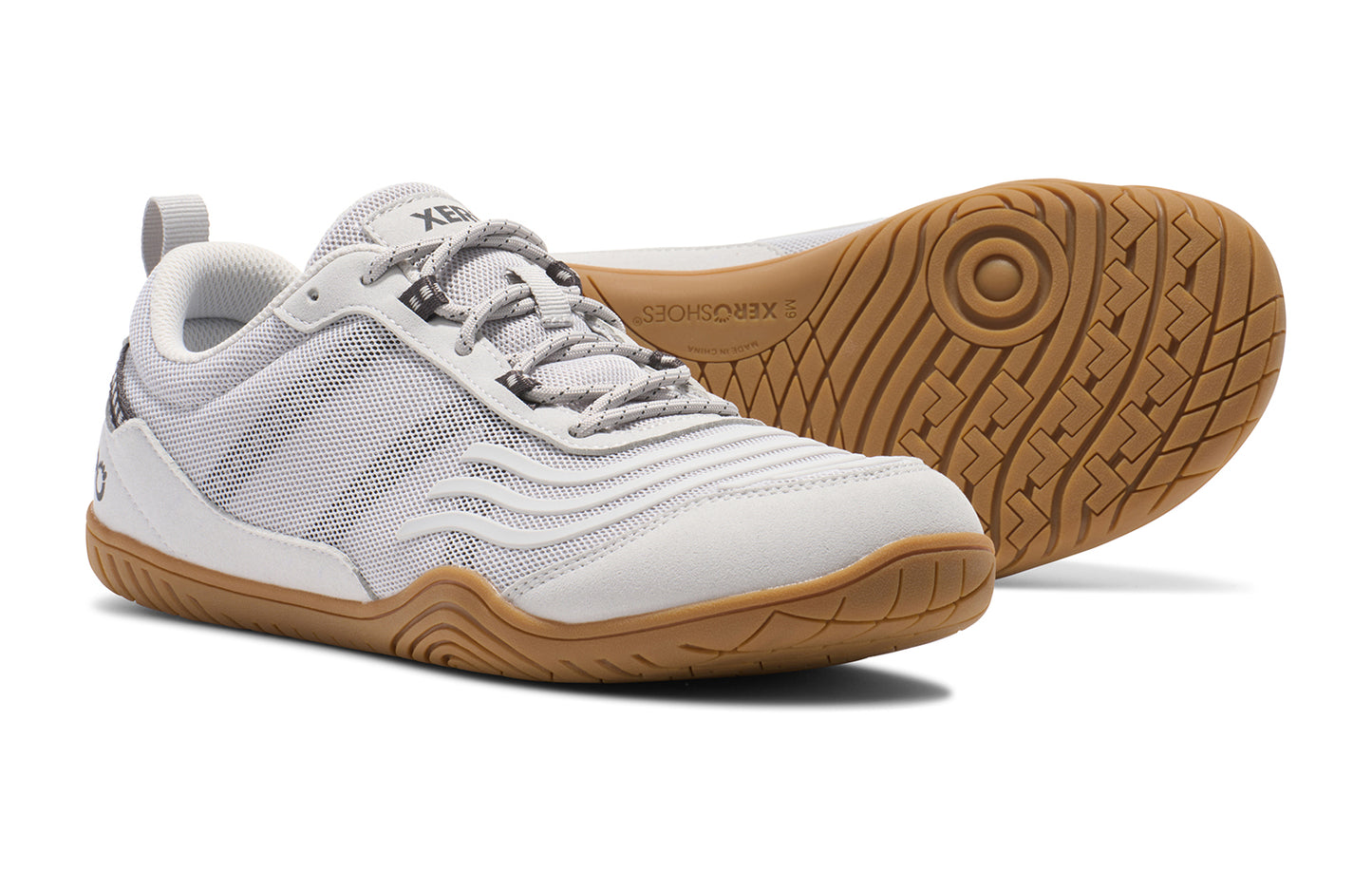 Xero shoes Canada, specifically barefoot running shoes Canada. These minimalist shoes have flexible soles, wide toe boxes, and zero drop. Pair view of Xero Men's 360s in Lunar Rock/Gum. A cross-training shoe.