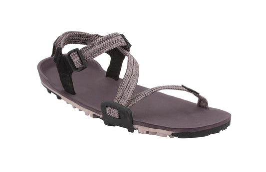 Xero Shoes Canada, specifically women’s barefoot shoes Canada. These minimalist shoes have flexible soles, wide toe boxes, and zero drop. Angled view of Xero Women's Z-Trail EV in Dusty Rose. Trail hiking, running, and recovery sandal.
