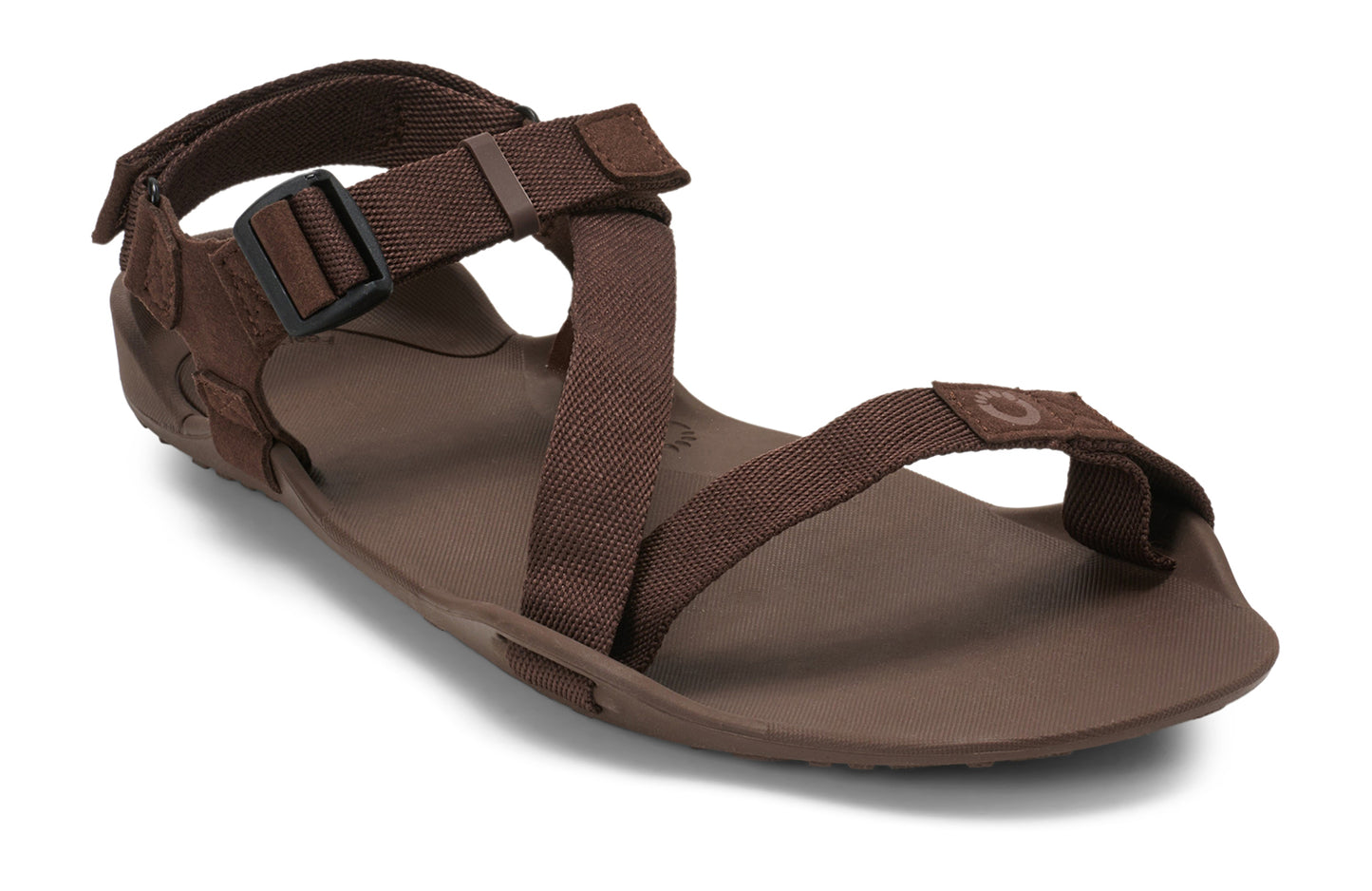 Xero Barefoot Shoes sold in Ontario, Canada. These minimalist shoes have flexible soles, wide toe boxes, and zero drop. Angled view of Xero Men's Z-Trek in Brown, a lightweight packable sport sandal.