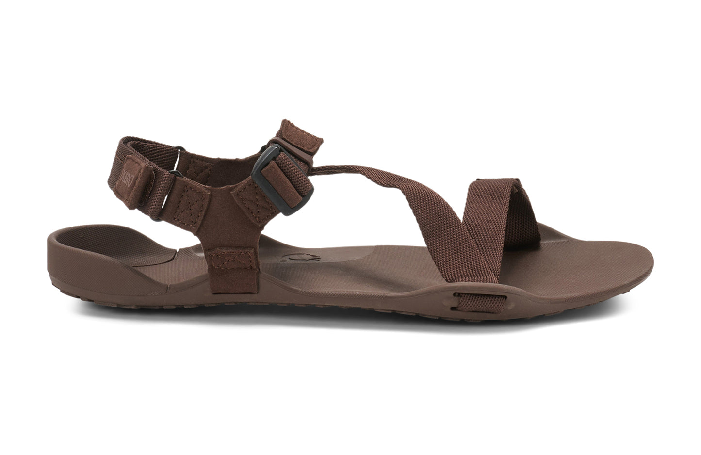Xero Barefoot Shoes sold in Ontario, Canada. These minimalist shoes have flexible soles, wide toe boxes, and zero drop. Lateral side view of Xero Men's Z-Trek in Brown, a lightweight packable sport sandal.