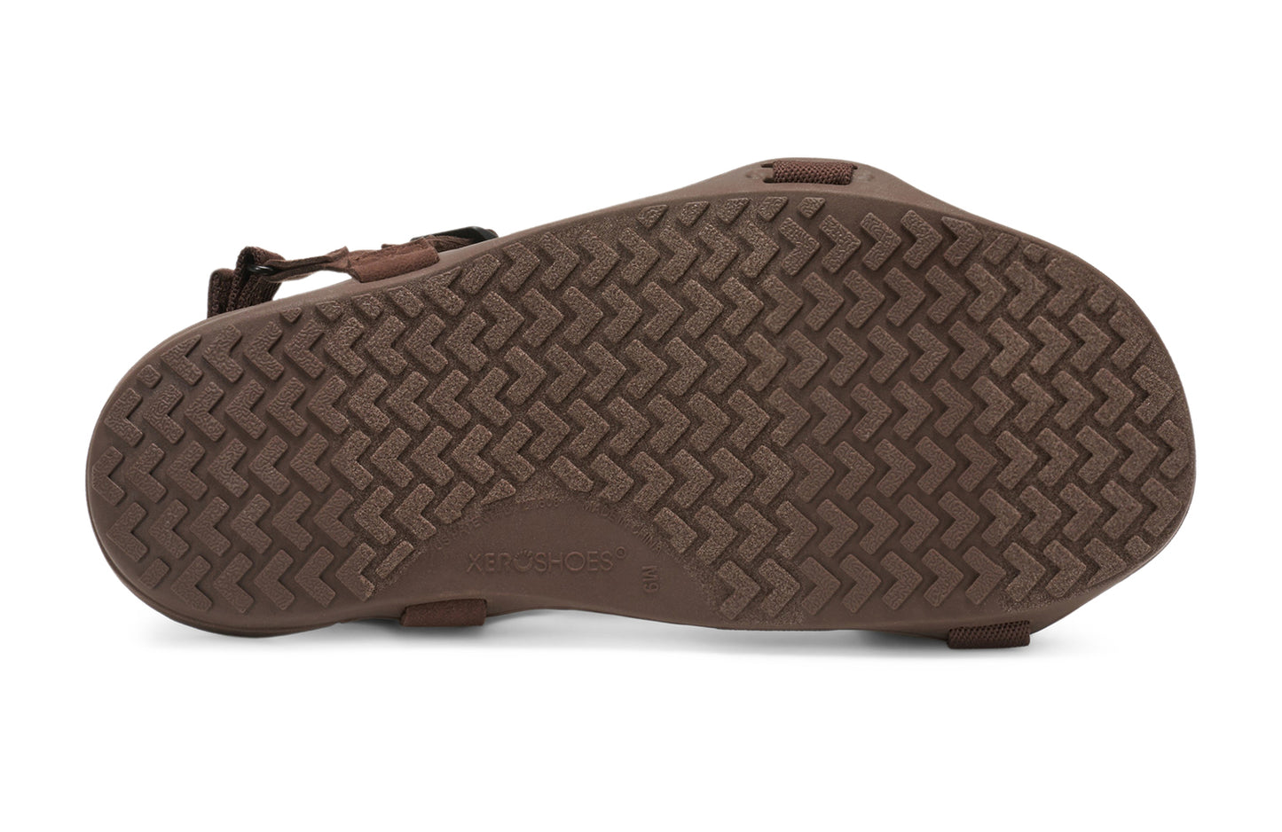 Xero Barefoot Shoes sold in Ontario, Canada. These minimalist shoes have flexible soles, wide toe boxes, and zero drop. Sole view of Xero Men's Z-Trek in Brown, a lightweight packable sport sandal.