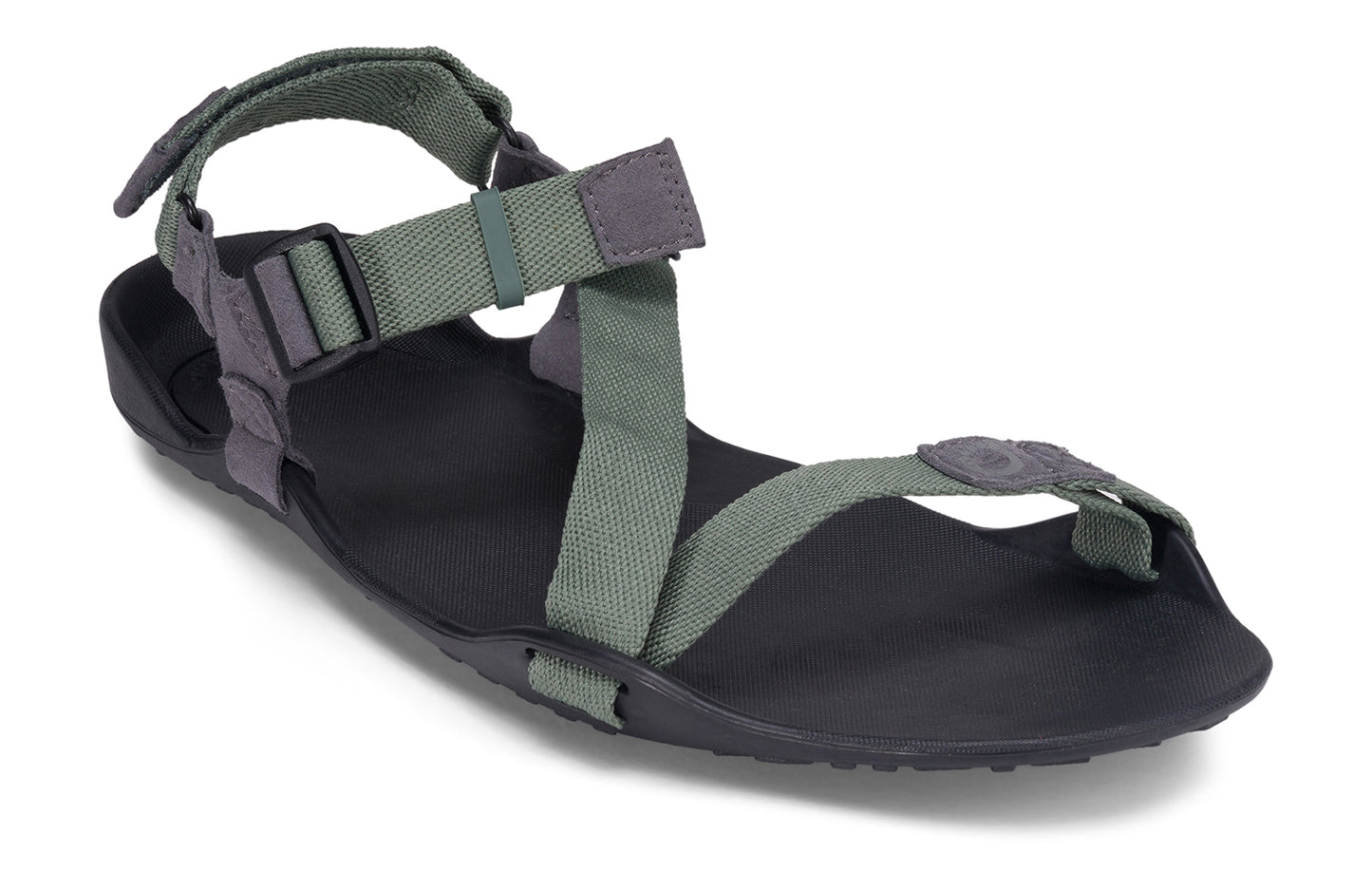 Xero Barefoot Shoes sold in Ontario, Canada. These minimalist shoes have flexible soles, wide toe boxes, and zero drop. Angled view of Xero Men's Z-Trek in Forest, a lightweight packable sport sandal.