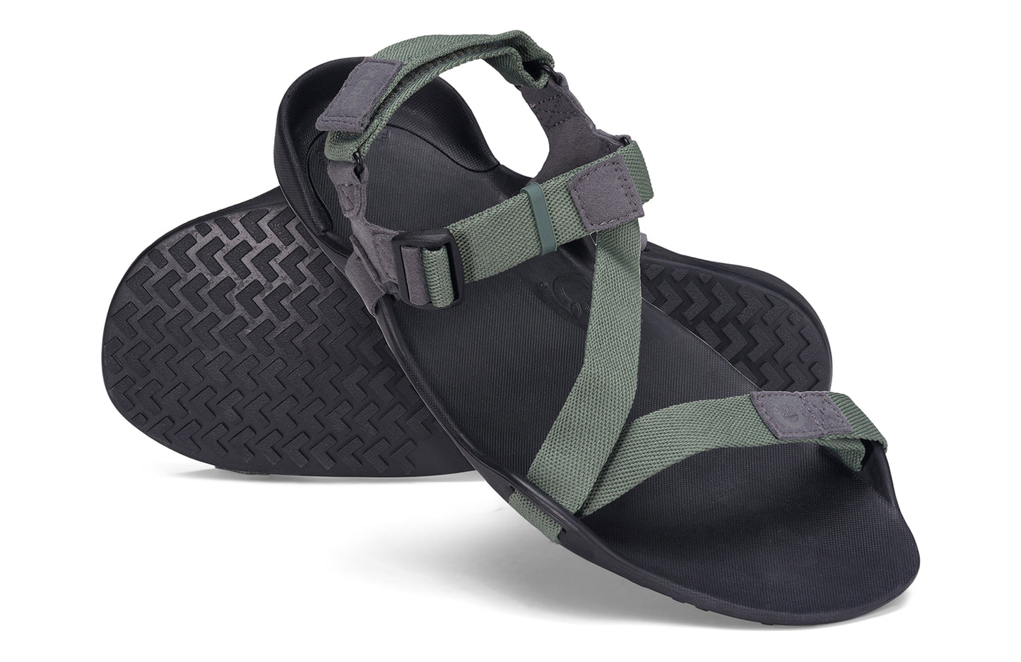 Xero Barefoot Shoes sold in Ontario, Canada. These minimalist shoes have flexible soles, wide toe boxes, and zero drop. Angled pair view of Xero Men's Z-Trek in Forest, a lightweight packable sport sandal.