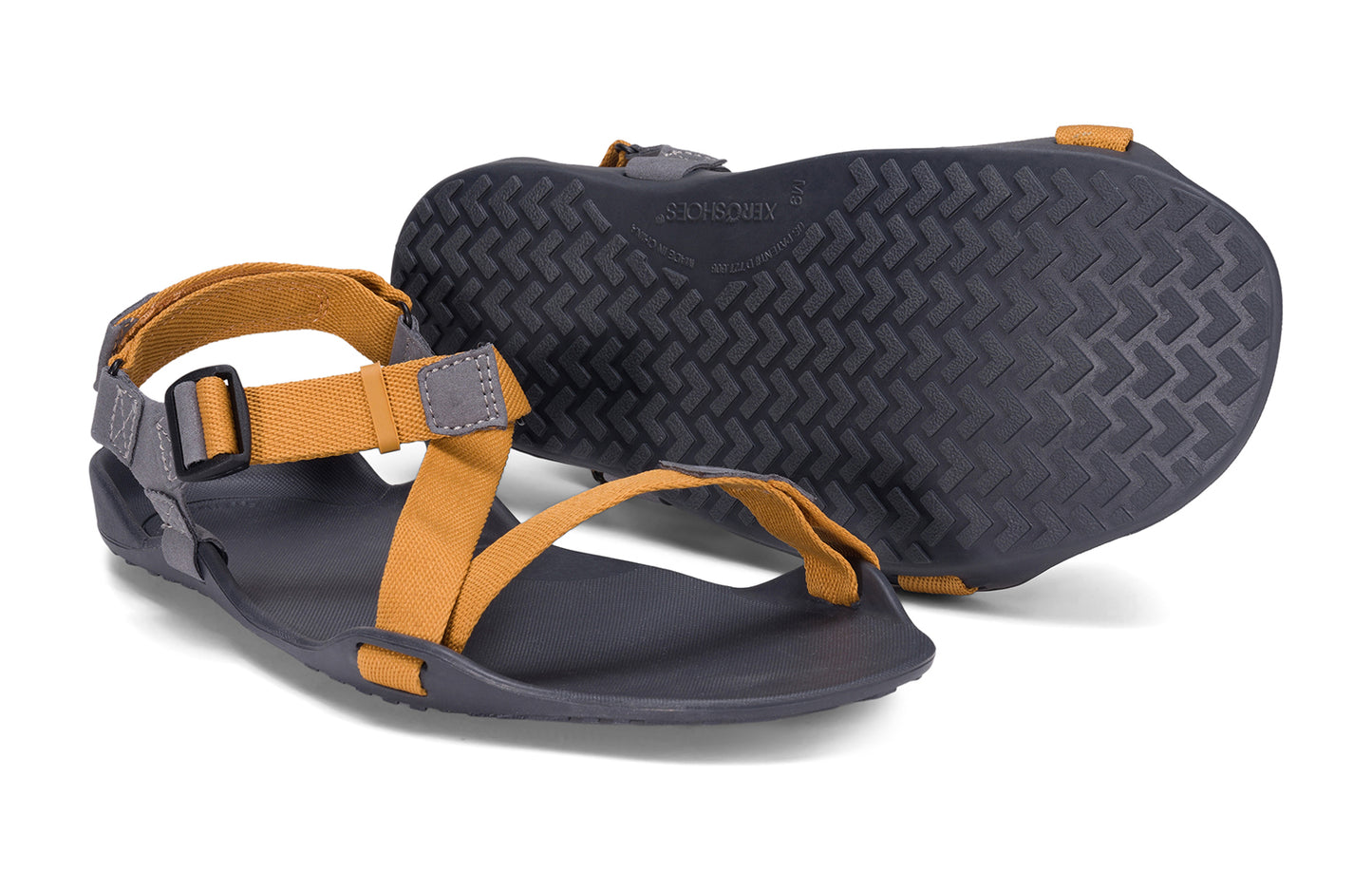 Xero Barefoot Shoes sold in Ontario, Canada. These minimalist shoes have flexible soles, wide toe boxes, and zero drop. Pair view of Xero Men's Z-Trek in Nugget, a lightweight packable sport sandal.
