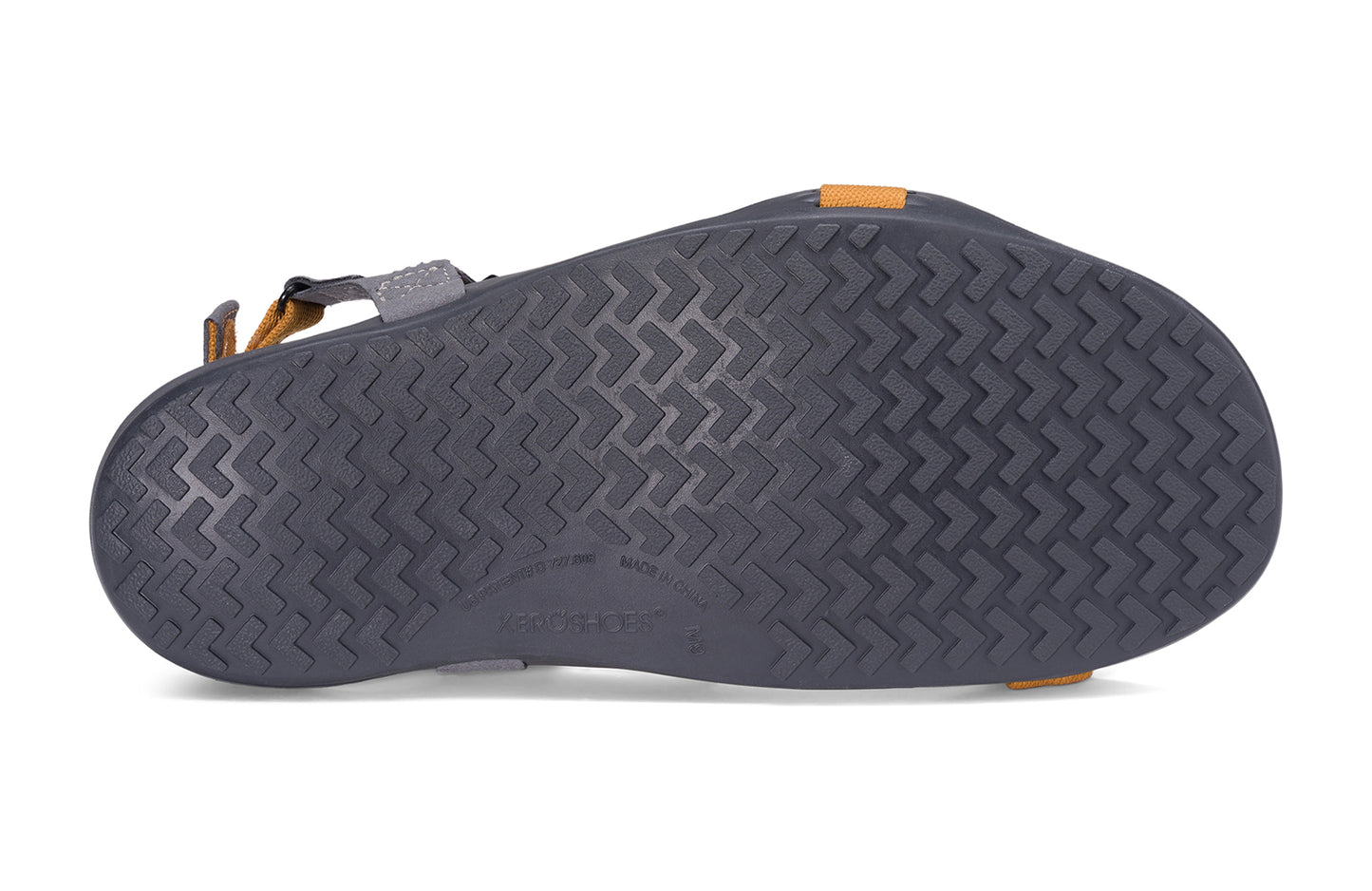 Xero Barefoot Shoes sold in Ontario, Canada. These minimalist shoes have flexible soles, wide toe boxes, and zero drop. Sole view of Xero Men's Z-Trek in Nugget, a lightweight packable sport sandal.