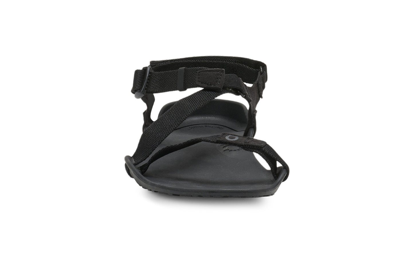Xero Barefoot Shoes sold in Ontario, Canada. These minimalist shoes have flexible soles, wide toe boxes, and zero drop. Front view of Xero Women's Z-Trek in Black, a lightweight packable sport sandal.