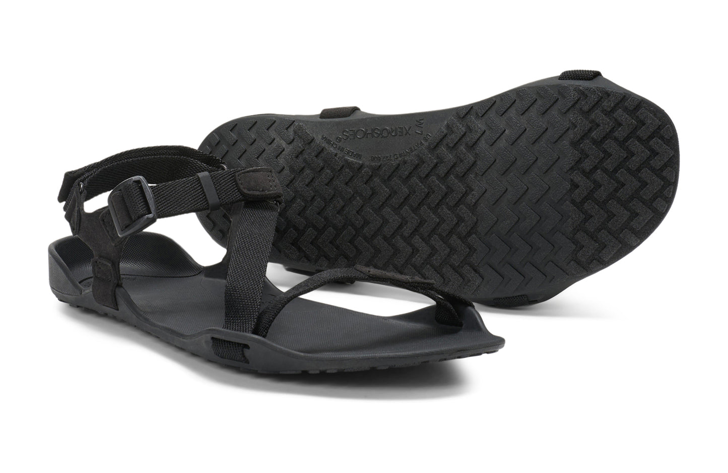 Xero Barefoot Shoes sold in Ontario, Canada. These minimalist shoes have flexible soles, wide toe boxes, and zero drop. Another pair view of Xero Women's Z-Trek in Black, a lightweight packable sport sandal.