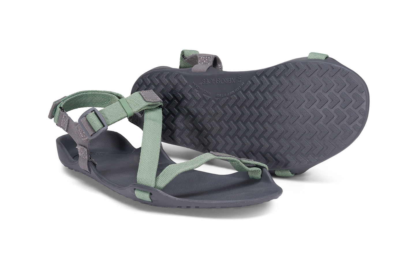 Xero Barefoot Shoes sold in Ontario, Canada. These minimalist shoes have flexible soles, wide toe boxes, and zero drop. Pair view of Xero Women's Z-Trek in Green, a lightweight packable sport sandal.