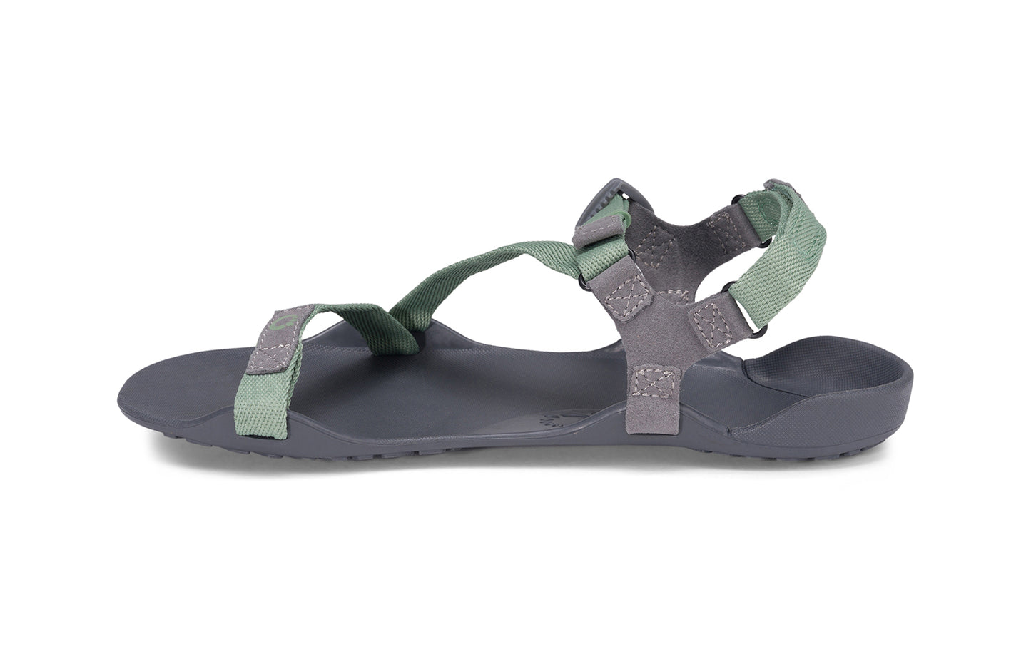 Xero Barefoot Shoes sold in Ontario, Canada. These minimalist shoes have flexible soles, wide toe boxes, and zero drop. Side view of Xero Women's Z-Trek in Green, a lightweight packable sport sandal.