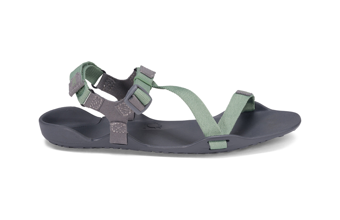 Xero Barefoot Shoes sold in Ontario, Canada. These minimalist shoes have flexible soles, wide toe boxes, and zero drop. Side view of Xero Women's Z-Trek in Green, a lightweight packable sport sandal.